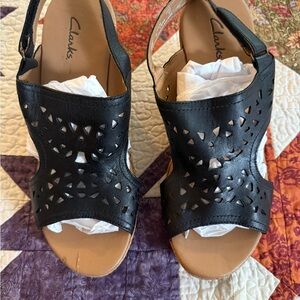 Clarks Women's Black Cut-Out Wedges